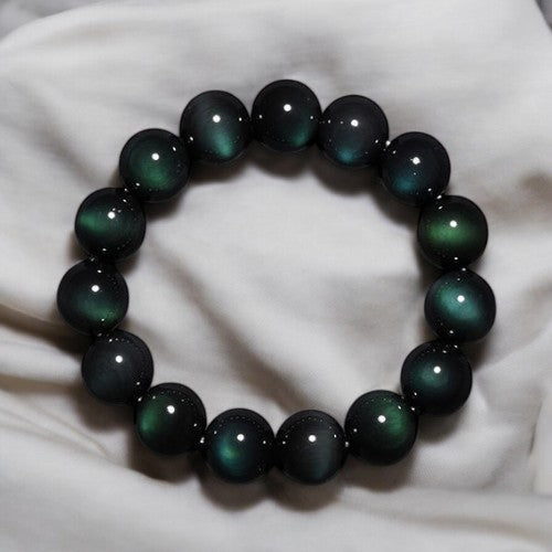 Green Eye Obsidian Wealth Bracelet fabric