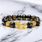 Feng_Shui_Pixiu_Black_Obsidian_Bracelet_Marble_Backdrop